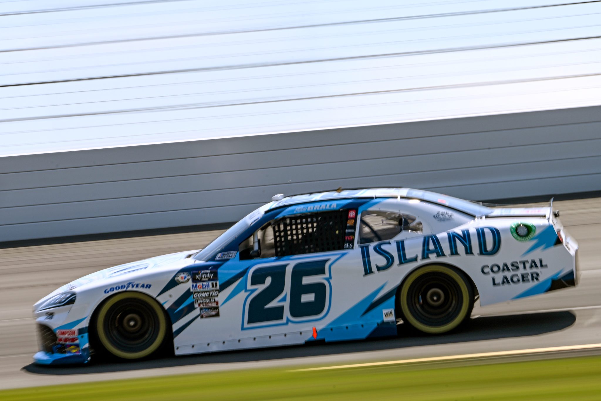 LONG POND, PENNSYLVANIA - JULY 21: Kaz Grala, driver of the #26 Island Coastal Lager Toyota, drives during practice for the NASCAR Xfinity Series Pocono 225 at Pocono Raceway on July 21, 2023 in Long Pond, Pennsylvania. (Photo by Logan Riely/Getty Images) | Getty Images