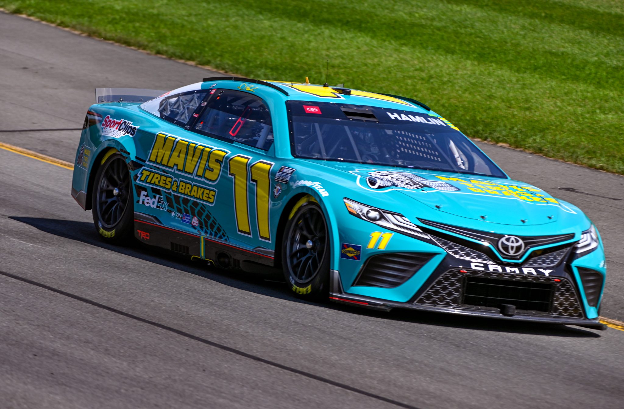 LONG POND, PENNSYLVANIA - JULY 22: Denny Hamlin, driver of the #11 Mavis Tires & Brakes Toyota, drives during practice for the NASCAR Cup Series HighPoint.com 400 at Pocono Raceway on July 22, 2023 in Long Pond, Pennsylvania. (Photo by Logan Riely/Getty Images) | Getty Images