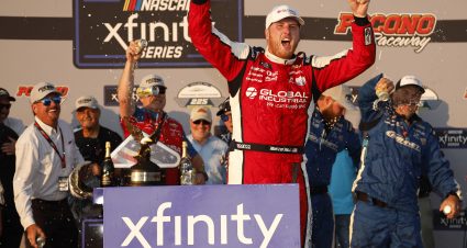 LONG POND, PENNSYLVANIA - JULY 22: Austin Hill, driver of the #21 Global Industrial Chevrolet, celebrates in victory lane after winning the NASCAR Xfinity Series Pocono 225 at Pocono Raceway on July 22, 2023 in Long Pond, Pennsylvania. (Photo by Sean Gardner/Getty Images) | Getty Images