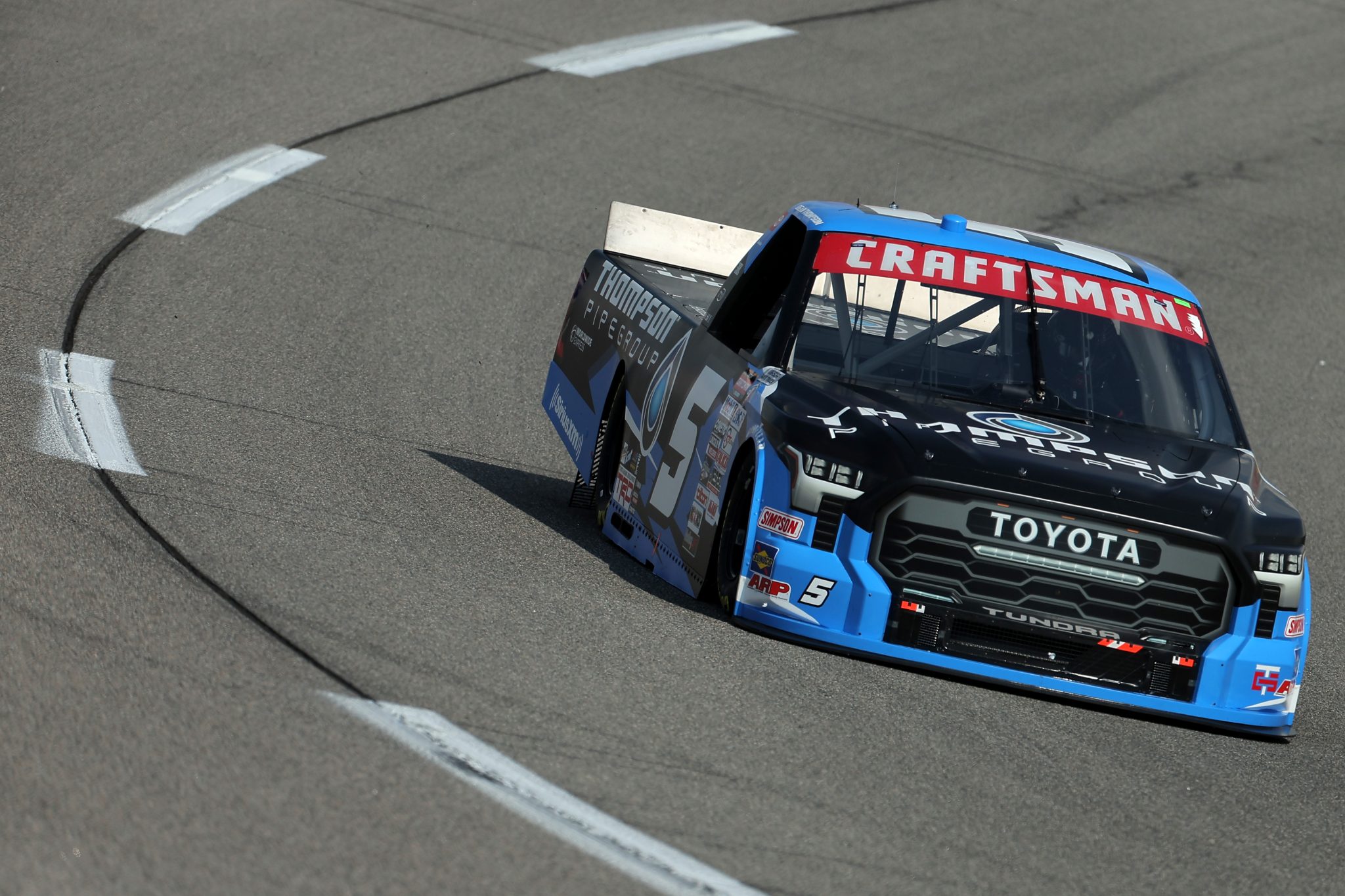 RICHMOND, VIRGINIA - JULY 28: Dean Thompson, driver of the #5 Thompson Pipe Group Toyota, drives during practice for the NASCAR Craftsman Truck Series Worldwide Express 250 at Richmond Raceway on July 28, 2023 in Richmond, Virginia. (Photo by Jonathan Bachman/Getty Images) | Getty Images