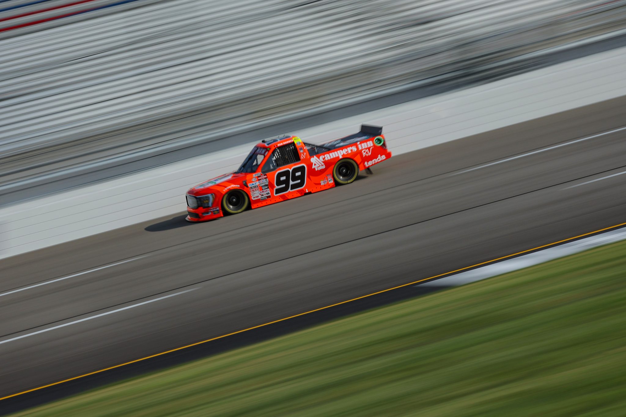 RICHMOND, VIRGINIA - JULY 28: Ben Rhodes, driver of the #99 Campers Inn RV Ford, drives during qualifying for the NASCAR Craftsman Truck Series Worldwide Express 250 at Richmond Raceway on July 28, 2023 in Richmond, Virginia. (Photo by Jonathan Bachman/Getty Images) | Getty Images