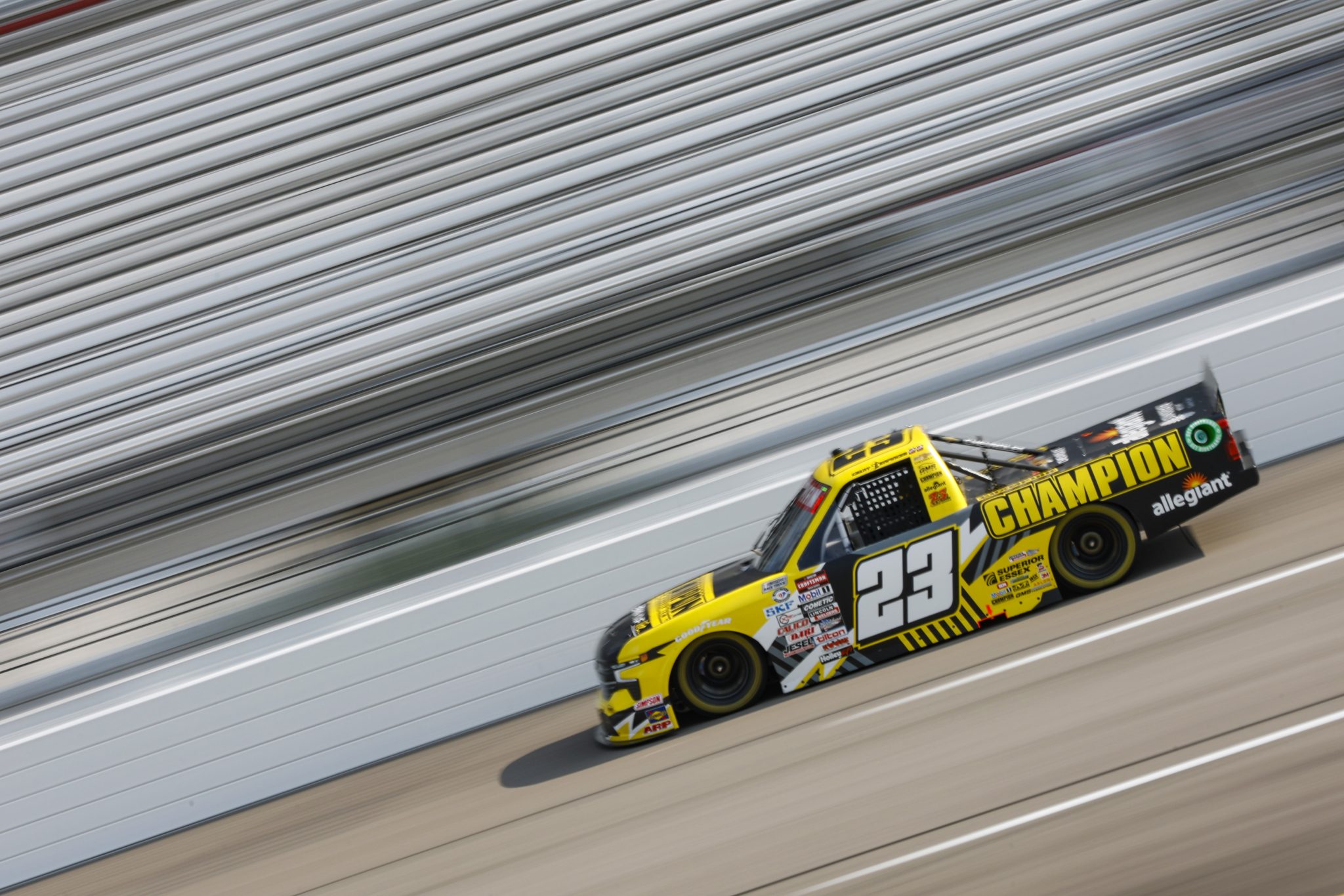 RICHMOND, VIRGINIA - JULY 28: Grant Enfinger, driver of the #23 Champion Power Equipment Chevrolet, drives during practice for the NASCAR Craftsman Truck Series Worldwide Express 250 at Richmond Raceway on July 28, 2023 in Richmond, Virginia. (Photo by Sean Gardner/Getty Images) | Getty Images