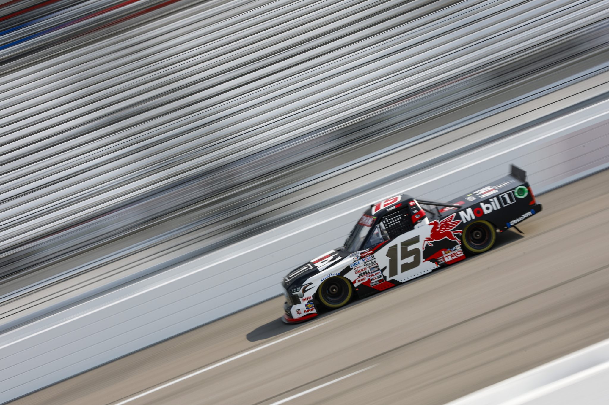 RICHMOND, VIRGINIA - JULY 28: Tanner Gray, driver of the #15 Mobil 1 Toyota, drives during practice for the NASCAR Craftsman Truck Series Worldwide Express 250 at Richmond Raceway on July 28, 2023 in Richmond, Virginia. (Photo by Sean Gardner/Getty Images) | Getty Images