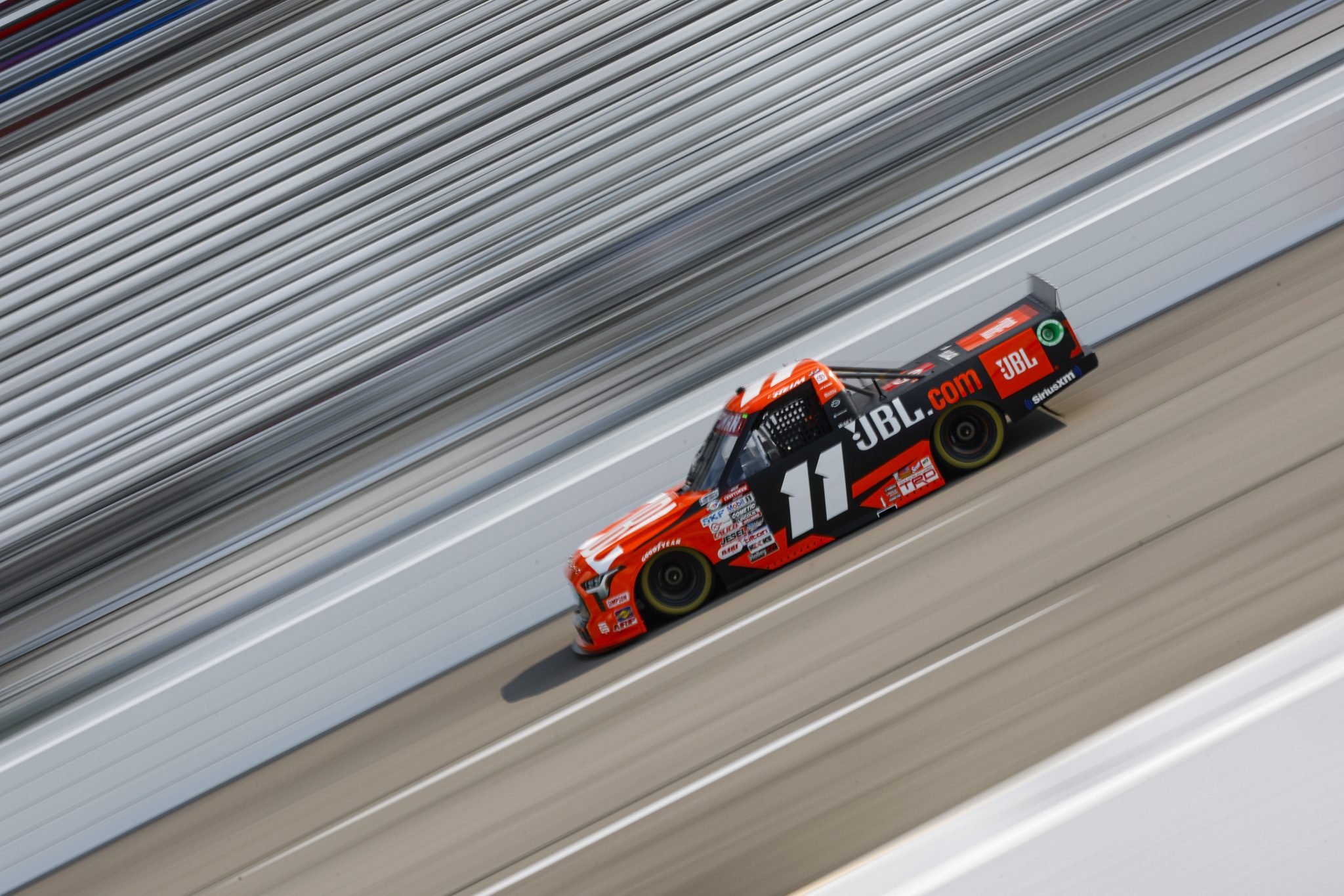 RICHMOND, VIRGINIA - JULY 28: Corey Heim, driver of the #11 JBL Toyota, drives during practice for the NASCAR Craftsman Truck Series Worldwide Express 250 at Richmond Raceway on July 28, 2023 in Richmond, Virginia. (Photo by Sean Gardner/Getty Images) | Getty Images