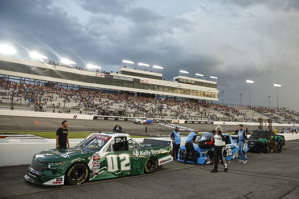 RICHMOND, VIRGINIA - JULY 29: A general view of trucks parked on the grid during a weather-delayed start of the NASCAR Craftsman Truck Series Worldwide Express 250 at Richmond Raceway on July 29, 2023 in Richmond, Virginia. (Photo by Sean Gardner/Getty Images) | Getty Images