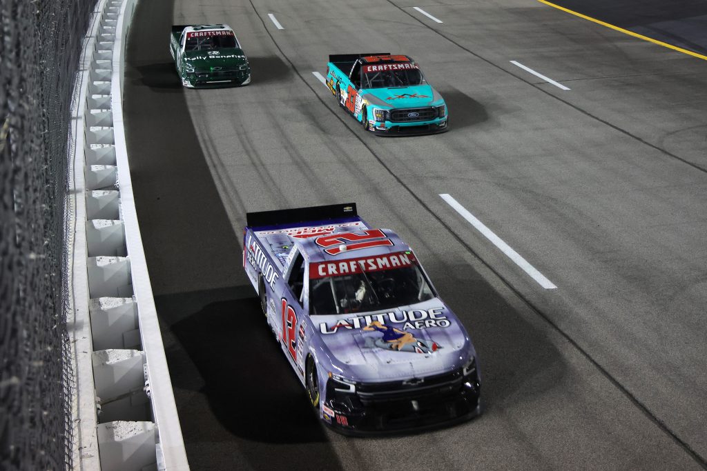 RICHMOND, VIRGINIA - JULY 29: Spencer Boyd, driver of the #12 Latitude Aero Chevrolet, Derek Lemke, driver of the #33 Levrack Ford, and Will Rodgers, driver of the #02 Kelly Benefits Chevrolet, race during the NASCAR Craftsman Truck Series Worldwide Express 250 at Richmond Raceway on July 29, 2023 in Richmond, Virginia. (Photo by Jonathan Bachman/Getty Images) | Getty Images
