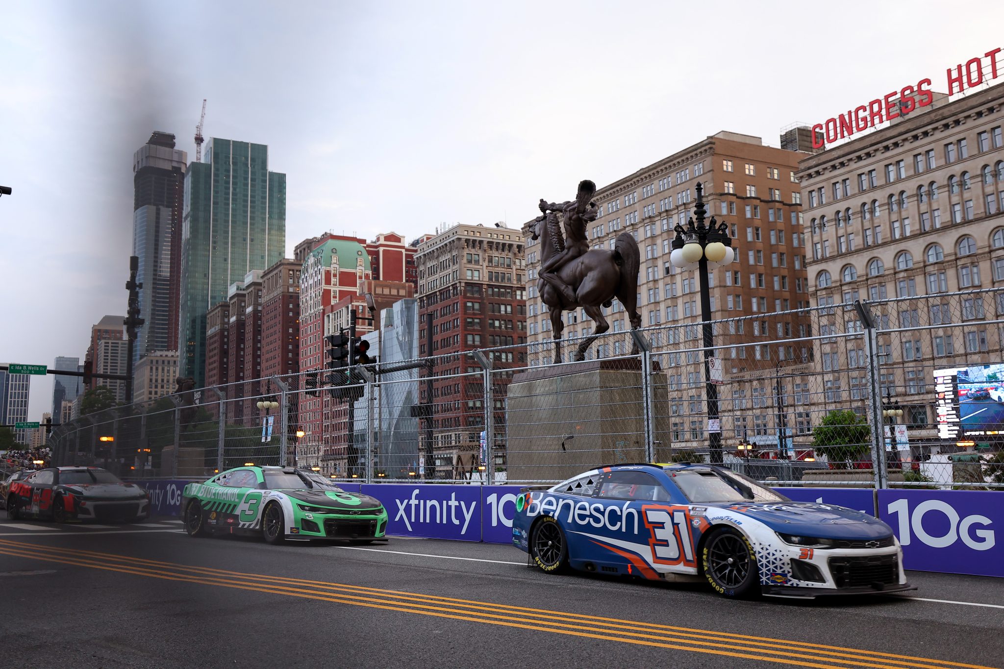 CHICAGO, ILLINOIS - JULY 02: Justin Haley, driver of the #31 Benesch Law Chevrolet, leads the field during the NASCAR Cup Series Grant Park 220 at the Chicago Street Course on July 02, 2023 in Chicago, Illinois. (Photo by Michael Reaves/Getty Images) | Getty Images