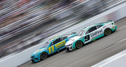 RICHMOND, VIRGINIA - JULY 30: Denny Hamlin, driver of the #11 Mavis Tires & Brakes Toyota, and Chase Elliott, driver of the #9 UniFirst Chevrolet, race during the NASCAR Cup Series Cook Out 400 at Richmond Raceway on July 30, 2023 in Richmond, Virginia. (Photo by Sean Gardner/Getty Images) | Getty Images