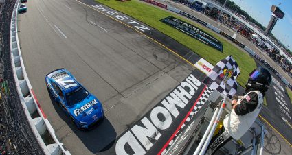 RICHMOND, VIRGINIA - JULY 30: Chris Buescher, driver of the #17 Fastenal Ford, takes the checkered flag to win the NASCAR Cup Series Cook Out 400 at Richmond Raceway on July 30, 2023 in Richmond, Virginia. (Photo by Jonathan Bachman/Getty Images) | Getty Images