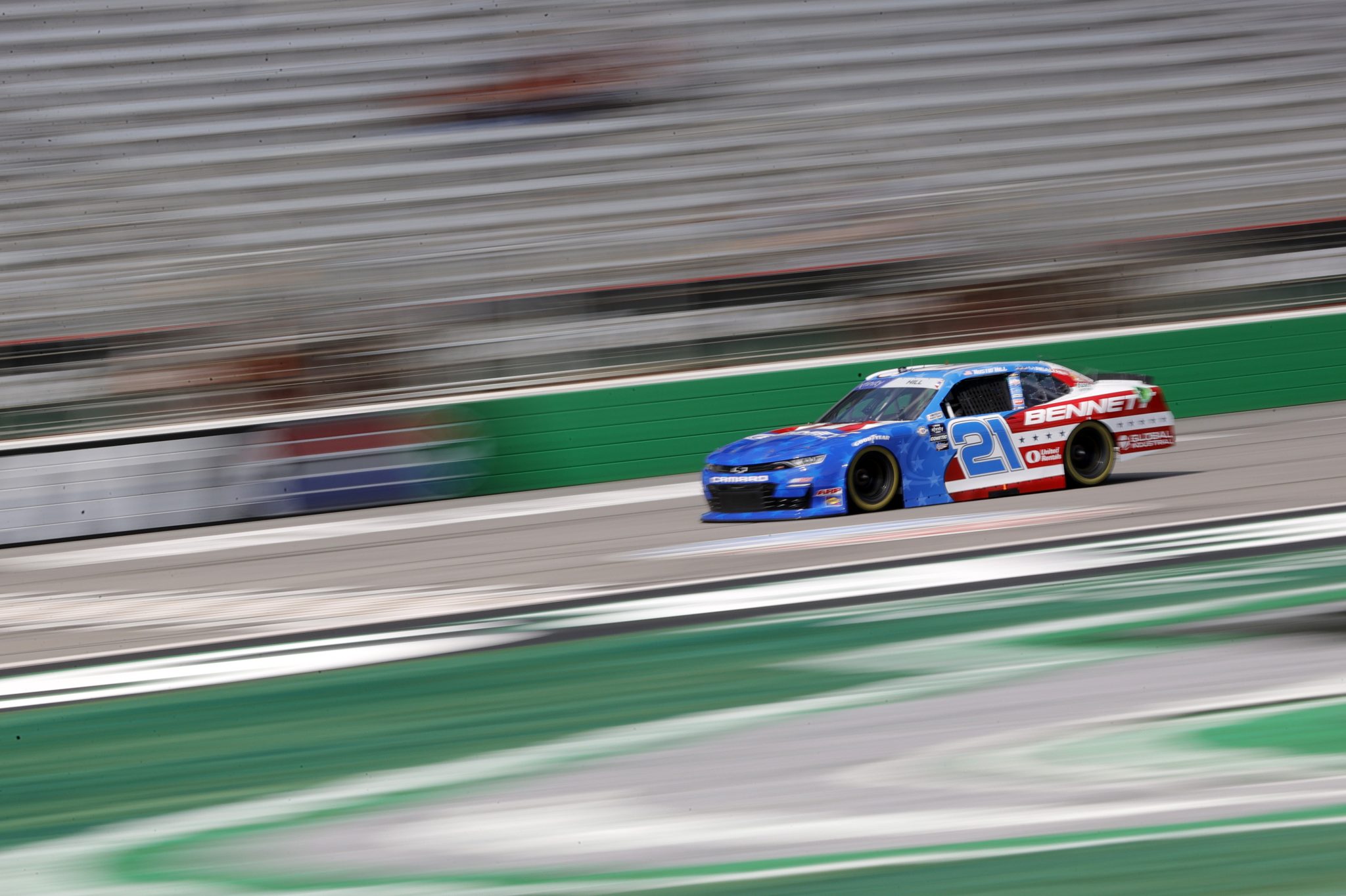 HAMPTON, GEORGIA - JULY 08: Austin Hill, driver of the #21 Bennett Transportation Chevrolet, drives during qualifying for the NASCAR Xfinity Series Alsco Uniforms 250 at Atlanta Motor Speedway on July 08, 2023 in Hampton, Georgia. (Photo by Alex Slitz/Getty Images) | Getty Images