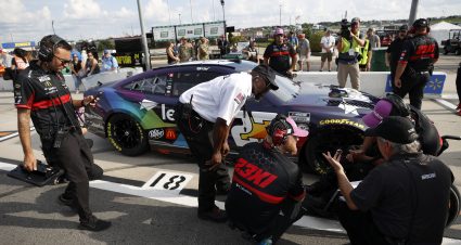 HAMPTON, GEORGIA - JULY 08: Crew members of the #23 Leidos Toyota, driven by Bubba Wallace speak with a NASCAR Official during qualifying for the NASCAR Cup Series Quaker State 400 Available at Walmart at Atlanta Motor Speedway on July 08, 2023 in Hampton, Georgia. (Photo by Chris Graythen/Getty Images) | Getty Images