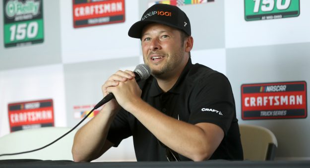 LEXINGTON, OHIO - JULY 07: Marco Andretti, driver of the #7 Group1001 Chevrolet, speaks to the media during a press conference after qualifying for the NASCAR Craftsman Truck Series O'Reilly Auto Parts 150 at Mid-Ohio Sports Car Course on July 07, 2023 in Lexington, Ohio. (Photo by Meg Oliphant/Getty Images) | Getty Images