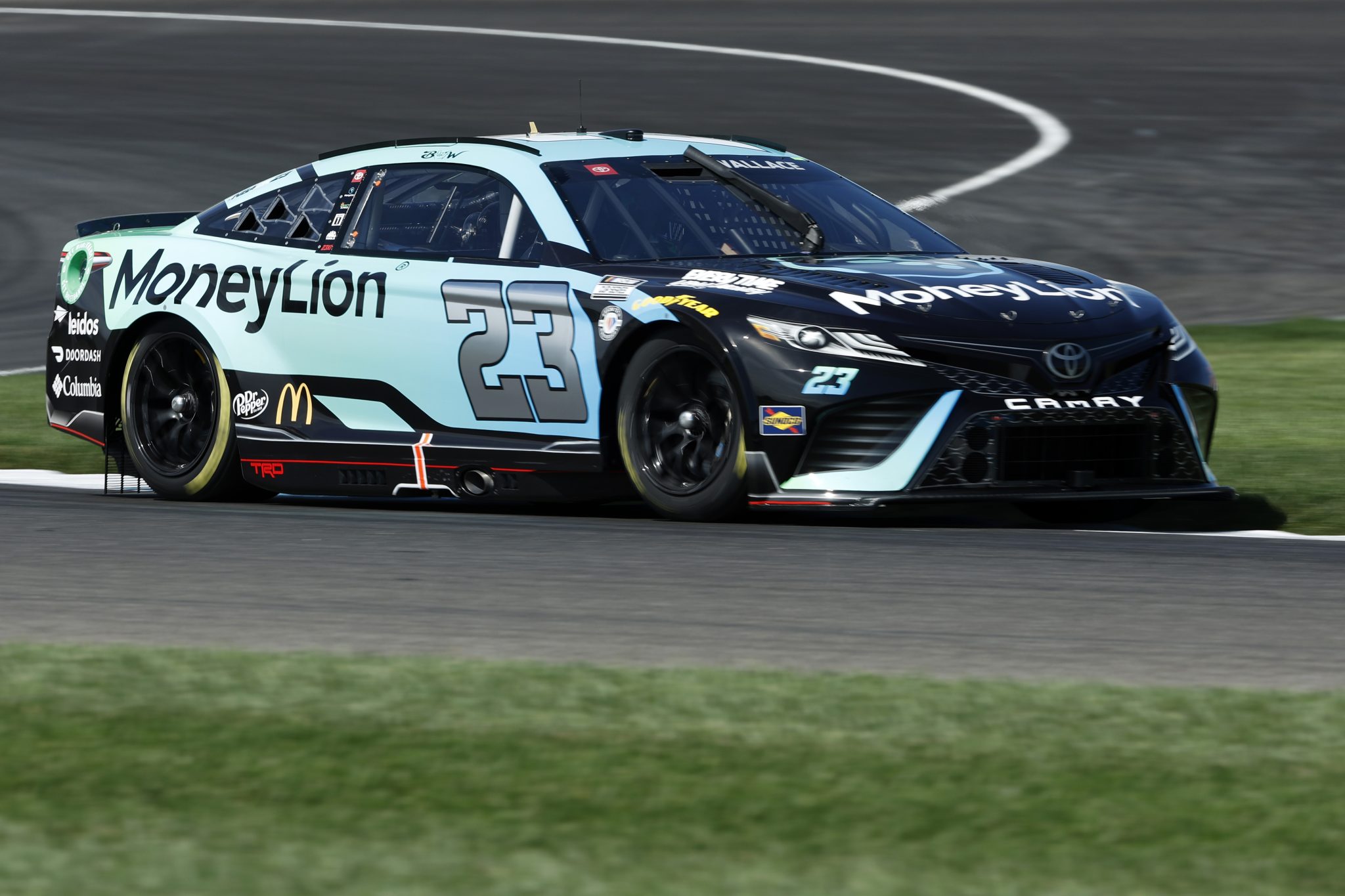 INDIANAPOLIS, INDIANA - AUGUST 12: Bubba Wallace, driver of the #23 MoneyLion Toyota, drives during practice for the NASCAR Cup Series Verizon 200 at the Brickyard at Indianapolis Motor Speedway on August 12, 2023 in Indianapolis, Indiana. (Photo by Justin Casterline/Getty Images) | Getty Images