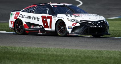 INDIANAPOLIS, INDIANA - AUGUST 12: Kamui Kobayashi, driver of the #67 Toyota Genuine Parts Toyota, drives during practice for the NASCAR Cup Series Verizon 200 at the Brickyard at Indianapolis Motor Speedway on August 12, 2023 in Indianapolis, Indiana. (Photo by Justin Casterline/Getty Images) | Getty Images