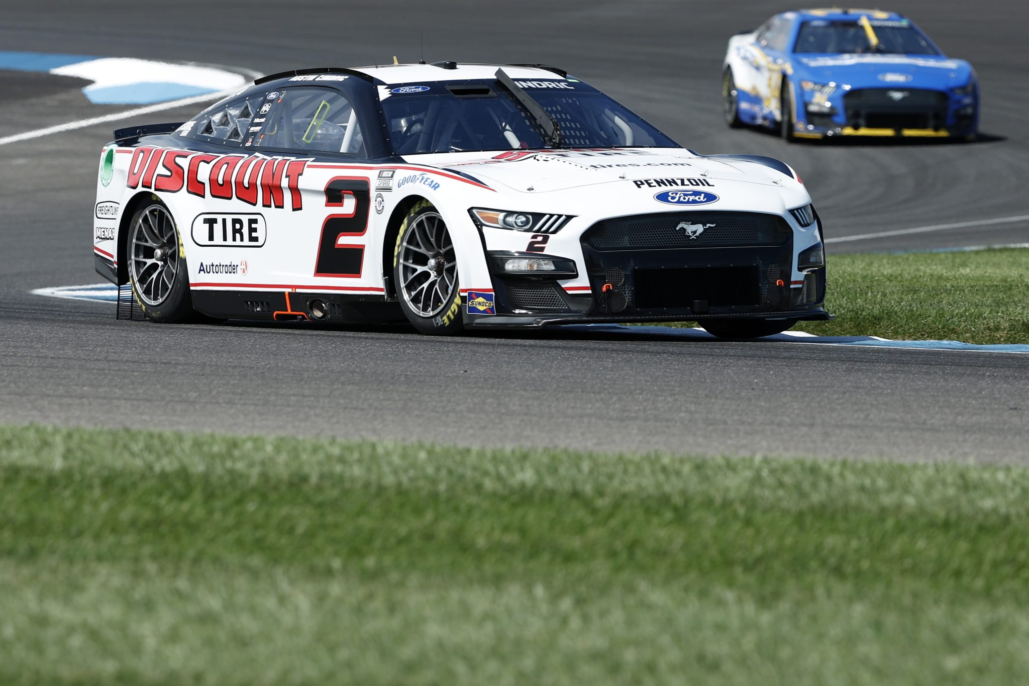 INDIANAPOLIS, INDIANA - AUGUST 12: Austin Cindric, driver of the #2 Discount Tire Ford, drives during practice for the NASCAR Cup Series Verizon 200 at the Brickyard at Indianapolis Motor Speedway on August 12, 2023 in Indianapolis, Indiana. (Photo by Justin Casterline/Getty Images) | Getty Images