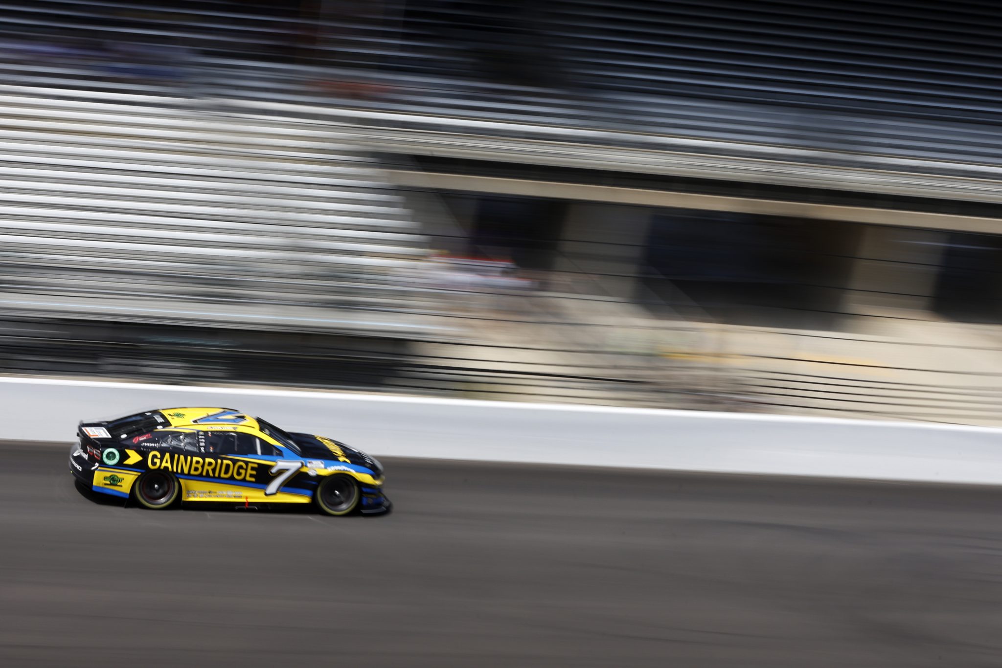INDIANAPOLIS, INDIANA - AUGUST 12: Corey LaJoie, driver of the #7 Gainbridge Chevrolet, drives during qualifying for the NASCAR Cup Series Verizon 200 at the Brickyard at Indianapolis Motor Speedway on August 12, 2023 in Indianapolis, Indiana. (Photo by Sean Gardner/Getty Images) | Getty Images
