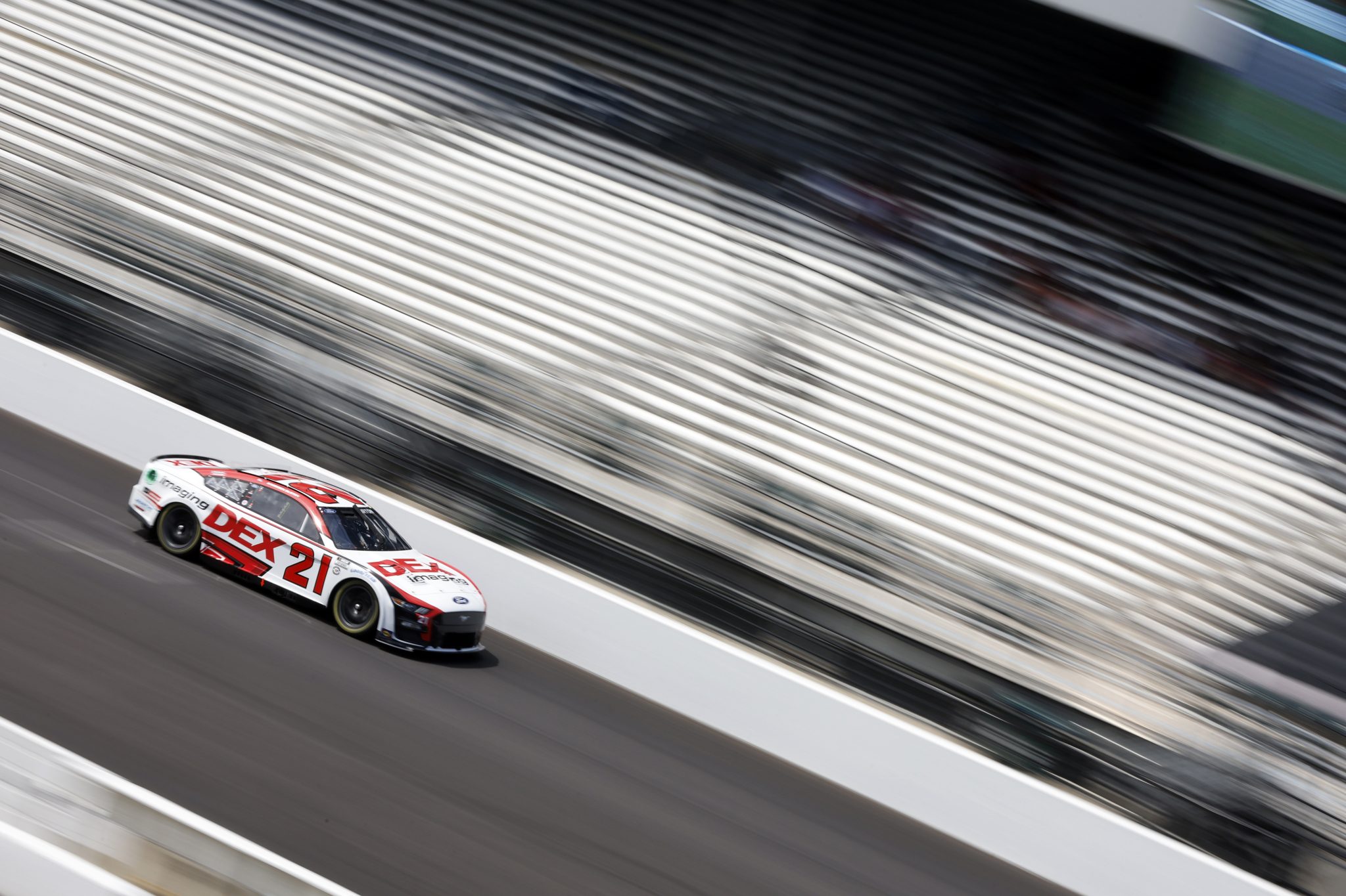 INDIANAPOLIS, INDIANA - AUGUST 12: Harrison Burton, driver of the #21 DEX Imaging Ford, drives during practice for the NASCAR Cup Series Verizon 200 at the Brickyard at Indianapolis Motor Speedway on August 12, 2023 in Indianapolis, Indiana. (Photo by Sean Gardner/Getty Images) | Getty Images