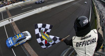INDIANAPOLIS, INDIANA - AUGUST 13: Michael McDowell, driver of the #34 Horizon Hobby Ford, takes the checkered flag to win the NASCAR Cup Series Verizon 200 at the Brickyard at Indianapolis Motor Speedway on August 13, 2023 in Indianapolis, Indiana. (Photo by Meg Oliphant/Getty Images) | Getty Images