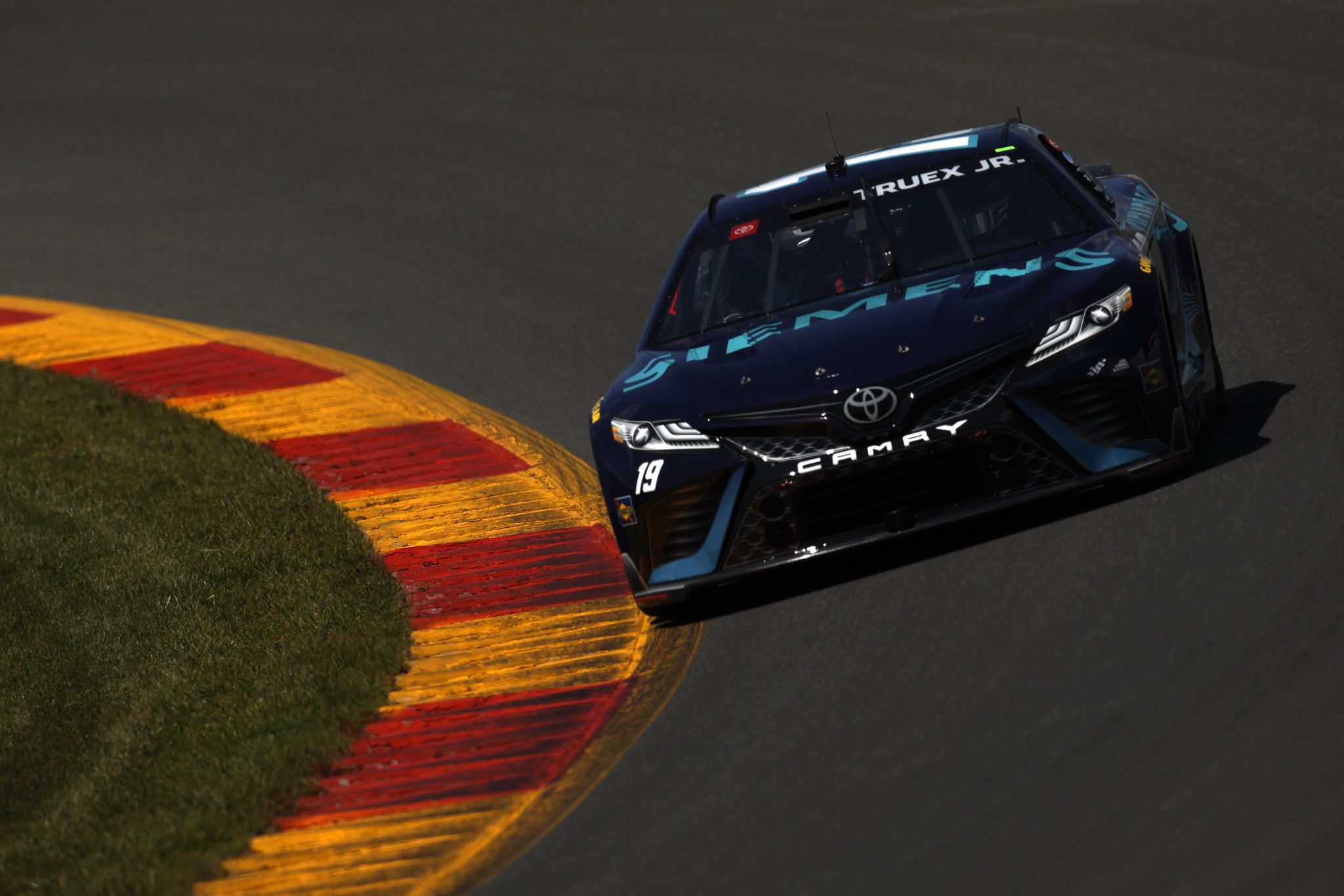 WATKINS GLEN, NEW YORK - AUGUST 19: Martin Truex Jr., driver of the #19 Siemens Toyota, drives during practice for the NASCAR Cup Series Go Bowling at The Glen at Watkins Glen International on August 19, 2023 in Watkins Glen, New York. (Photo by Sean Gardner/Getty Images) | Getty Images