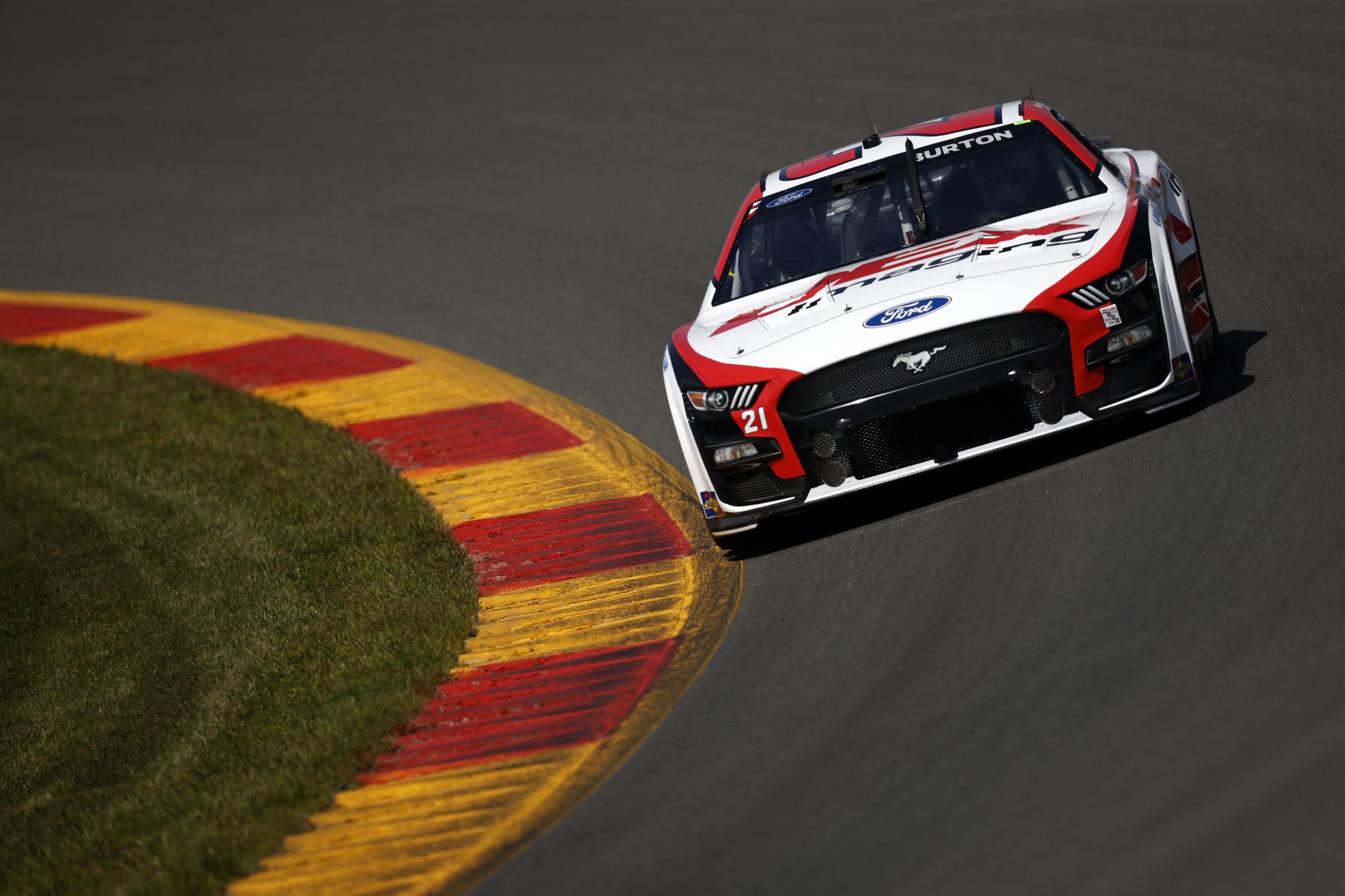 WATKINS GLEN, NEW YORK - AUGUST 19: Harrison Burton, driver of the #21 DEX Imaging Ford, drives during practice for the NASCAR Cup Series Go Bowling at The Glen at Watkins Glen International on August 19, 2023 in Watkins Glen, New York. (Photo by Sean Gardner/Getty Images) | Getty Images