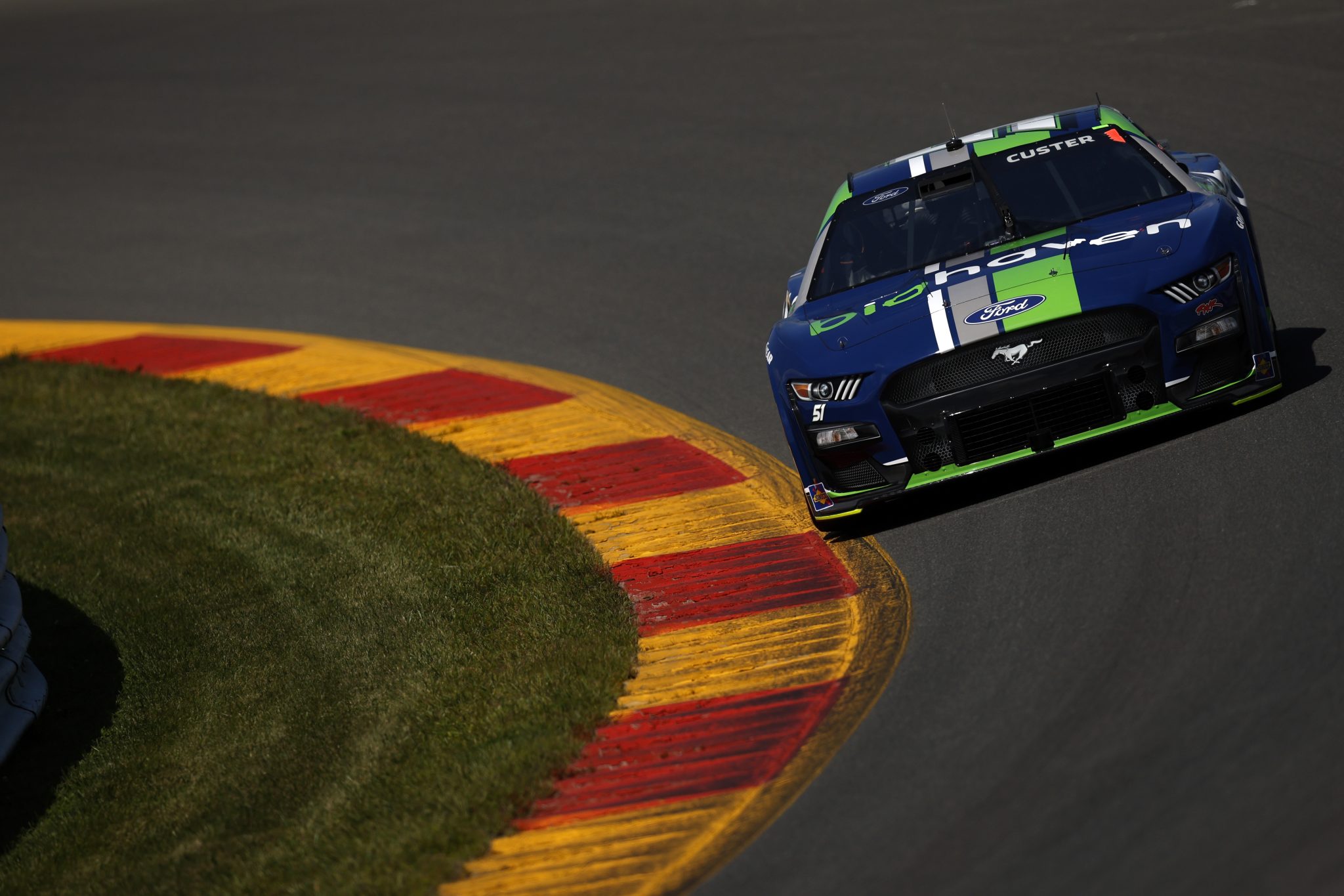 WATKINS GLEN, NEW YORK - AUGUST 19: Andy Lally, driver of the #51 Biohaven/Jacob Co. Ford, drives during practice for the NASCAR Cup Series Go Bowling at The Glen at Watkins Glen International on August 19, 2023 in Watkins Glen, New York. (Photo by Sean Gardner/Getty Images) | Getty Images