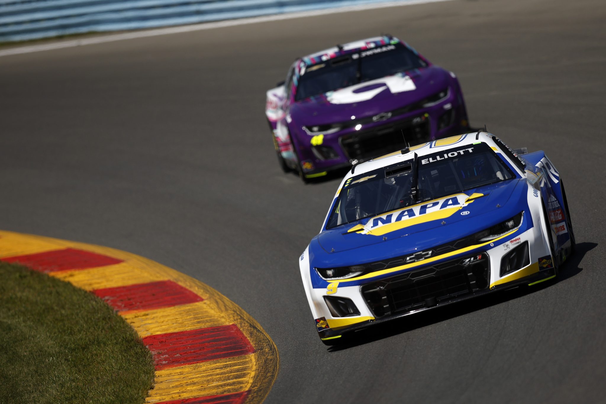 WATKINS GLEN, NEW YORK - AUGUST 19: Chase Elliott, driver of the #9 NAPA Auto Parts Chevrolet, and Alex Bowman, driver of the #48 Ally Chevrolet, drive during practice for the NASCAR Cup Series Go Bowling at The Glen at Watkins Glen International on August 19, 2023 in Watkins Glen, New York. (Photo by Sean Gardner/Getty Images) | Getty Images
