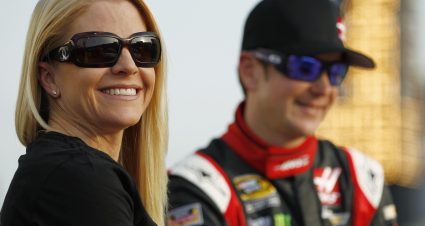 CHARLOTTE, NC - MAY 22: Patricia Driscoll stands on the grid with Kurt Busch, driver of the #41 Haas Automation Made in America Chevrolet, during qualifying for the NASCAR Sprint Cup Series Coca-Cola 600 at Charlotte Motor Speedway on May 22, 2014 in Charlotte, North Carolina.  (Photo by Jeff Zelevansky/NASCAR via Getty Images)