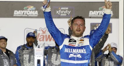 DAYTONA BEACH, FLORIDA - AUGUST 25: Justin Allgaier, driver of the #7 Hellmann's Chevrolet, celebrates in victory lane after winning  the NASCAR Xfinity Series Wawa 250 powered by Coca-Cola at Daytona International Speedway on August 25, 2023 in Daytona Beach, Florida. (Photo by Chris Graythen/Getty Images) | Getty Images