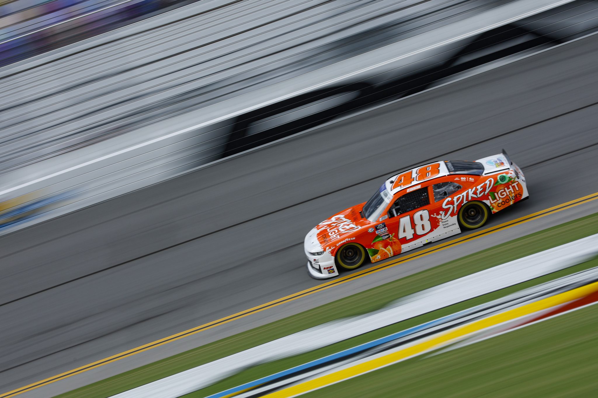 DAYTONA BEACH, FLORIDA - AUGUST 25: Parker Kligerman, driver of the #48 Spiked Coolers Light Orange Chevrolet, drives during qualifying for the NASCAR Cup Series Coke Zero Sugar 400 at Daytona International Speedway on August 25, 2023 in Daytona Beach, Florida. (Photo by Sean Gardner/Getty Images) | Getty Images