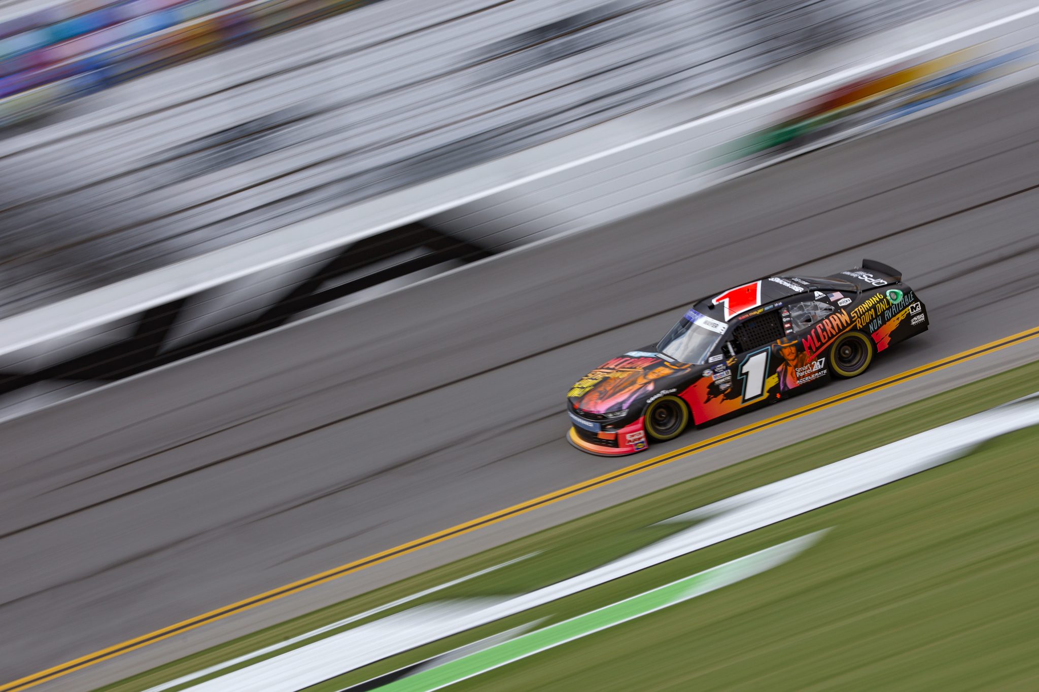 DAYTONA BEACH, FLORIDA - AUGUST 25: Sam Mayer, driver of the #1 Tim McGraw: Standing Room Only Chevrolet, drives during qualifying for the NASCAR Xfinity Series Wawa 250 powered by Coca-Cola at Daytona International Speedway on August 25, 2023 in Daytona Beach, Florida. (Photo by Sean Gardner/Getty Images) | Getty Images