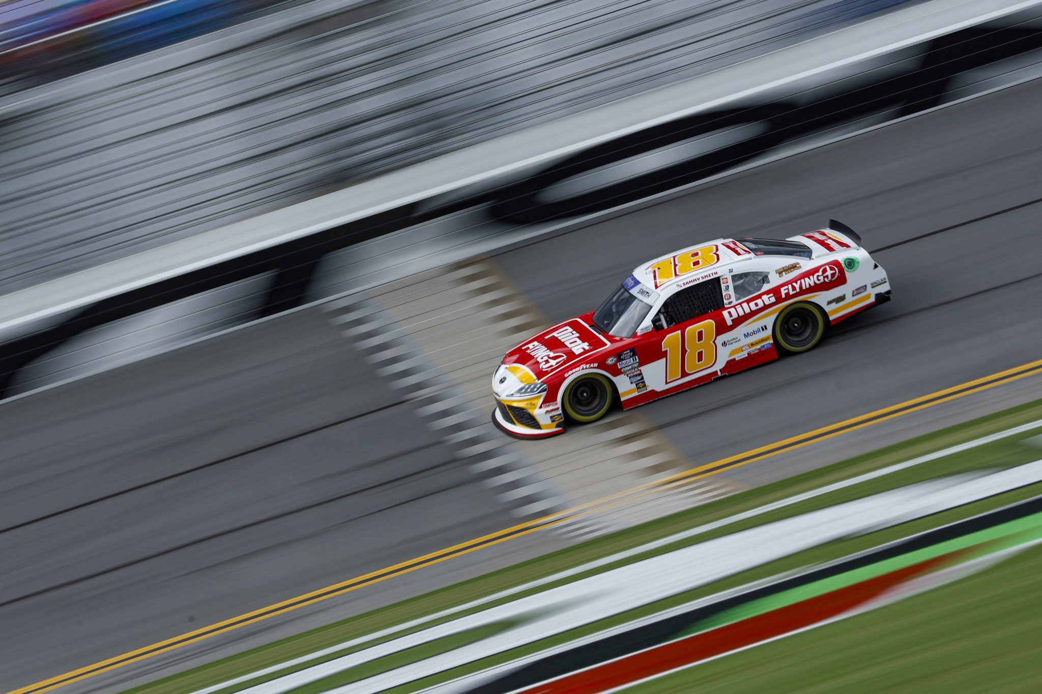 DAYTONA BEACH, FLORIDA - AUGUST 25: Sammy Smith, driver of the #18 Pilot Flying J Toyota, drives during qualifying for the NASCAR Cup Series Coke Zero Sugar 400 at Daytona International Speedway on August 25, 2023 in Daytona Beach, Florida. (Photo by Sean Gardner/Getty Images) | Getty Images