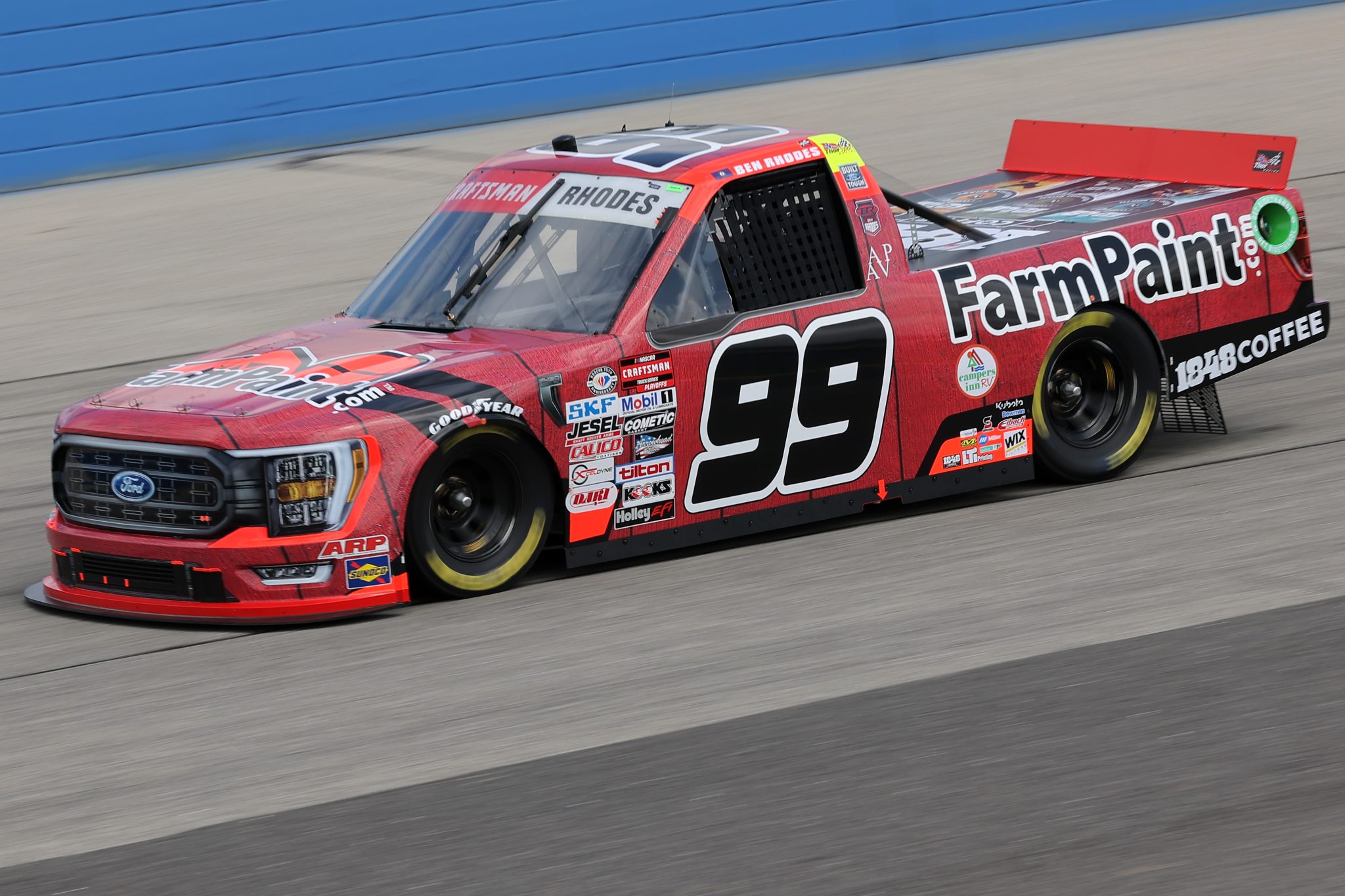 WEST ALLIS, WISCONSIN - AUGUST 26: Ben Rhodes, driver of the #99 Farm Paint/1848 Coffee Ford, drives during practice for the NASCAR Craftsman Truck Series Clean Harbors 175 at The Milwaukee Mile on August 26, 2023 in West Allis, Wisconsin. (Photo by Jonathan Bachman/Getty Images) | Getty Images