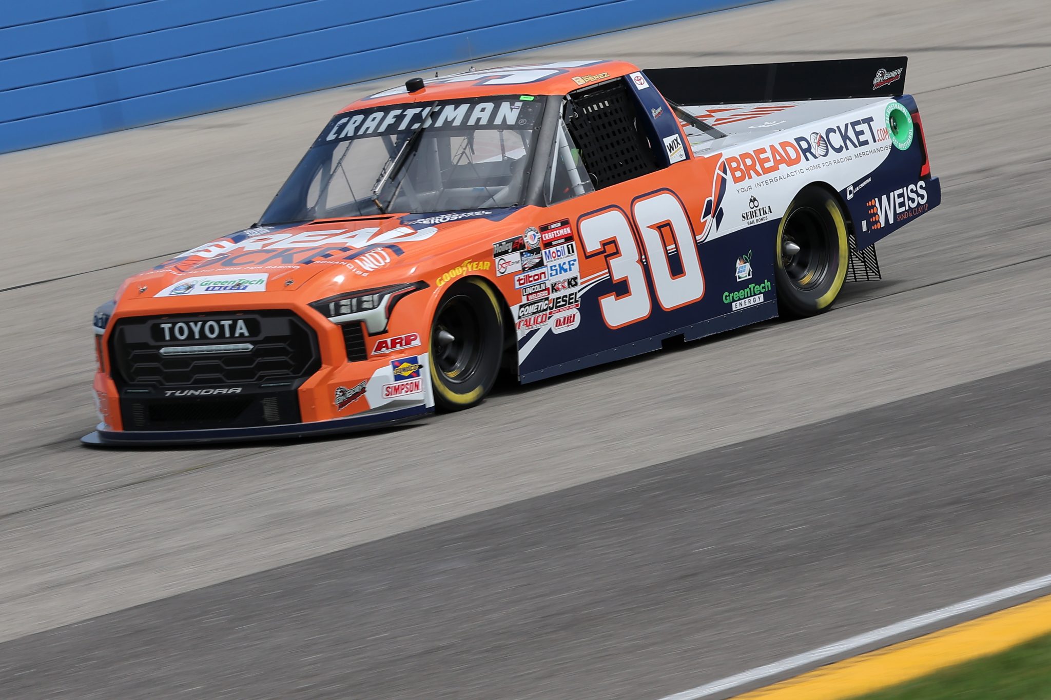 WEST ALLIS, WISCONSIN - AUGUST 26: Brad Perez, driver of the #30 Bread Rocket Toyota, drives during practice for the NASCAR Craftsman Truck Series Clean Harbors 175 at The Milwaukee Mile on August 26, 2023 in West Allis, Wisconsin. (Photo by Jonathan Bachman/Getty Images) | Getty Images