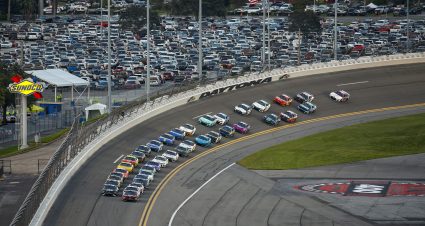 DAYTONA BEACH, FLORIDA - AUGUST 26: Chase Briscoe, driver of the #14 Magical Vacation Planner Ford, and Bubba Wallace, driver of the #23 Columbia Sportswear Company Toyota,lead the fieldduring the NASCAR Cup Series Coke Zero Sugar 400 at Daytona International Speedway on August 26, 2023 in Daytona Beach, Florida. (Photo by Sean Gardner/Getty Images) | Getty Images