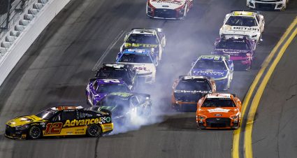 DAYTONA BEACH, FLORIDA - AUGUST 26: Ryan Blaney, driver of the #12 Advance Auto Parts Ford, Ty Gibbs, driver of the #54 Monster Energy Toyota, and Christopher Bell, driver of the #20 Yahoo! Toyota, spin after an on-track incident during the NASCAR Cup Series Coke Zero Sugar 400 at Daytona International Speedway on August 26, 2023 in Daytona Beach, Florida. (Photo by James Gilbert/Getty Images) | Getty Images