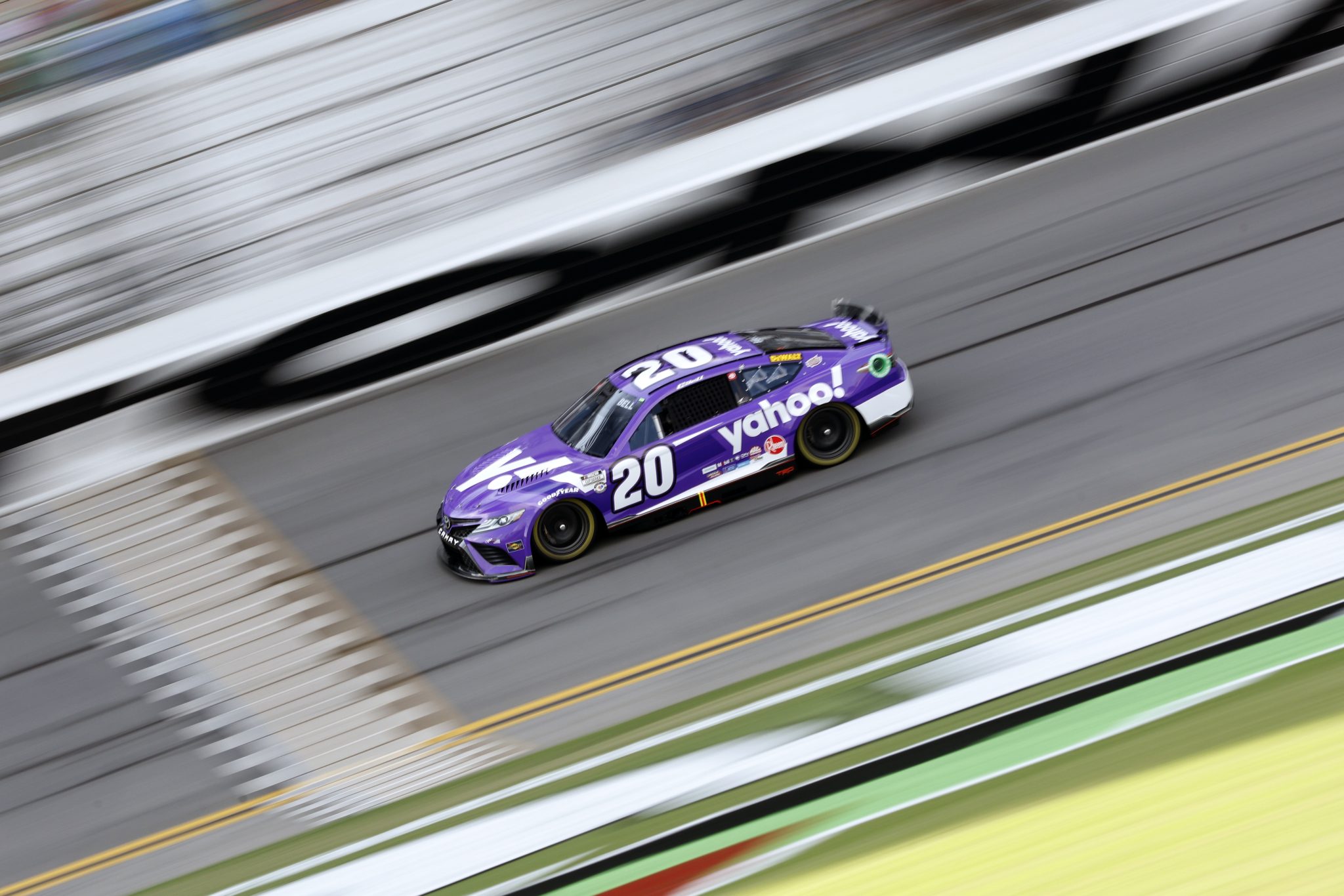 DAYTONA BEACH, FLORIDA - AUGUST 25: Christopher Bell, driver of the #20 Yahoo! Toyota, drives during qualifying for the NASCAR Cup Series Coke Zero Sugar 400 at Daytona International Speedway on August 25, 2023 in Daytona Beach, Florida. (Photo by Sean Gardner/Getty Images) | Getty Images