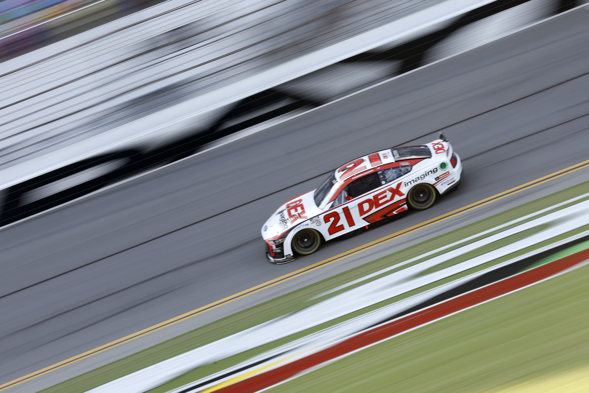 DAYTONA BEACH, FLORIDA - AUGUST 25: Harrison Burton, driver of the #21 DEX Imaging Ford, drives during qualifying for the NASCAR Cup Series Coke Zero Sugar 400 at Daytona International Speedway on August 25, 2023 in Daytona Beach, Florida. (Photo by Sean Gardner/Getty Images) | Getty Images