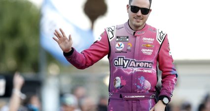DAYTONA BEACH, FLORIDA - AUGUST 26: Alex Bowman, driver of the #48 Ally Arena Chevrolet, waves to fans as he walks onstage during driver intros prior to the NASCAR Cup Series Coke Zero Sugar 400 at Daytona International Speedway on August 26, 2023 in Daytona Beach, Florida. (Photo by Sean Gardner/Getty Images) | Getty Images