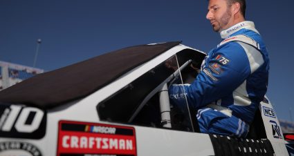 WEST ALLIS, WISCONSIN - AUGUST 27: Matt DiBenedetto, driver of the #25 Rackley Roofing Chevrolet, enters his truck during qualifying for the NASCAR Craftsman Truck Series Clean Harbors 175 at The Milwaukee Mile on August 27, 2023 in West Allis, Wisconsin. (Photo by Jonathan Bachman/Getty Images) | Getty Images