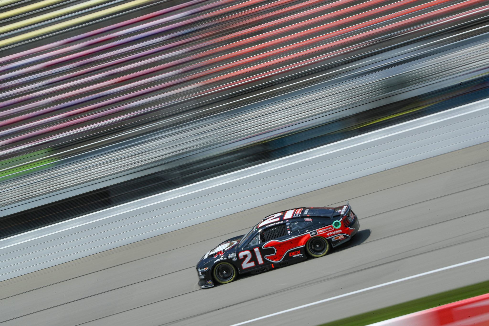 BROOKLYN, MICHIGAN - AUGUST 05: Harrison Burton, driver of the #21 Ford 20 Year Sr Master Techs Ford, drives during practice for the NASCAR Cup Series FireKeepers Casino 400 at Michigan International Speedway on August 05, 2023 in Brooklyn, Michigan. (Photo by Meg Oliphant/Getty Images) | Getty Images