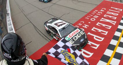 BROOKLYN, MICHIGAN - AUGUST 07: Chris Buescher, driver of the #17 Castrol Edge Ford, takes the checkered flag to win the NASCAR Cup Series FireKeepers Casino 400 at Michigan International Speedway on August 07, 2023 in Brooklyn, Michigan. (Photo by Meg Oliphant/Getty Images) | Getty Images