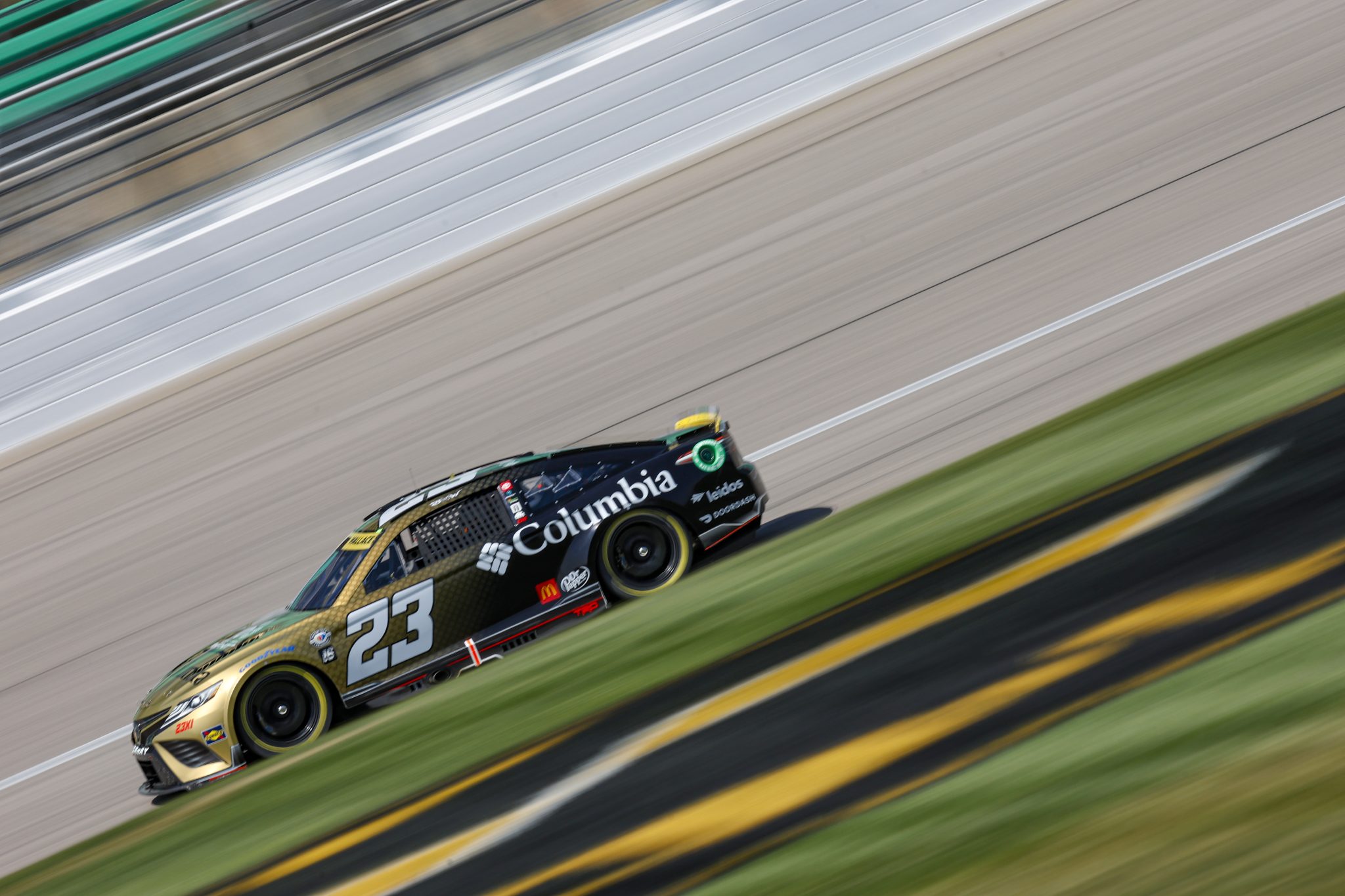 KANSAS CITY, KANSAS - SEPTEMBER 09: Bubba Wallace, driver of the #23 Columbia Sportswear Company Toyota, drives during qualifying for the NASCAR Cup Series Hollywood Casino 400 at Kansas Speedway on September 09, 2023 in Kansas City, Kansas. (Photo by Sean Gardner/Getty Images) | Getty Images