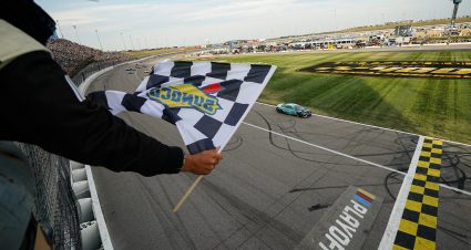 KANSAS CITY, KANSAS - SEPTEMBER 10: Tyler Reddick MoneyLion Toyota, driver of the #45 23XI Racing, takes the checkered flag to win the NASCAR Cup Series Hollywood Casino 400 at Kansas Speedway on September 10, 2023 in Kansas City, Kansas. (Photo by Jay Biggerstaff/Getty Images) | Getty Images