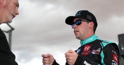 LAS VEGAS, NEVADA - MARCH 04: Ben Rhodes, driver of the #99 Toyota, and crew chief Richard Lushes talk on the grid during practice for the NASCAR Camping World Truck Series Victoria's Voice Foundation 200 at Las Vegas Motor Speedway on March 04, 2022 in Las Vegas, Nevada. (Photo by Meg Oliphant/Getty Images) | Getty Images