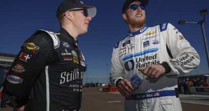 AVONDALE, ARIZONA - MARCH 12: Austin Hill, driver of the #21 United Rentals Chevrolet, (R) and John H. Nemechek, driver of the #26 Stillhouse Toyota, talk on the grid during qualifying for the NASCAR Xfinity Series United Rentals 200 at Phoenix Raceway on March 12, 2022 in Avondale, Arizona. (Photo by Sean Gardner/Getty Images) | Getty Images