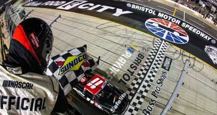 BRISTOL, TENNESSEE - SEPTEMBER 14: Corey Heim, driver of the #11 Safelite Toyota, takes the checkered flag to win the NASCAR Craftsman Truck Series UNOH 200 presented by Ohio Logistics at Bristol Motor Speedway on September 14, 2023 in Bristol, Tennessee. (Photo by Meg Oliphant/Getty Images) | Getty Images