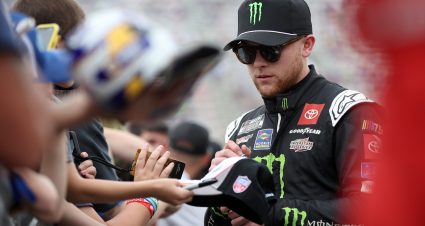 BRISTOL, TENNESSEE - SEPTEMBER 16: Ty Gibbs, driver of the #54 Monster Energy Toyota, signs autograph for NASCAR fans prior to the NASCAR Cup Series Bass Pro Shops Night Race at Bristol Motor Speedway on September 16, 2023 in Bristol, Tennessee. (Photo by Jared C. Tilton/Getty Images) | Getty Images