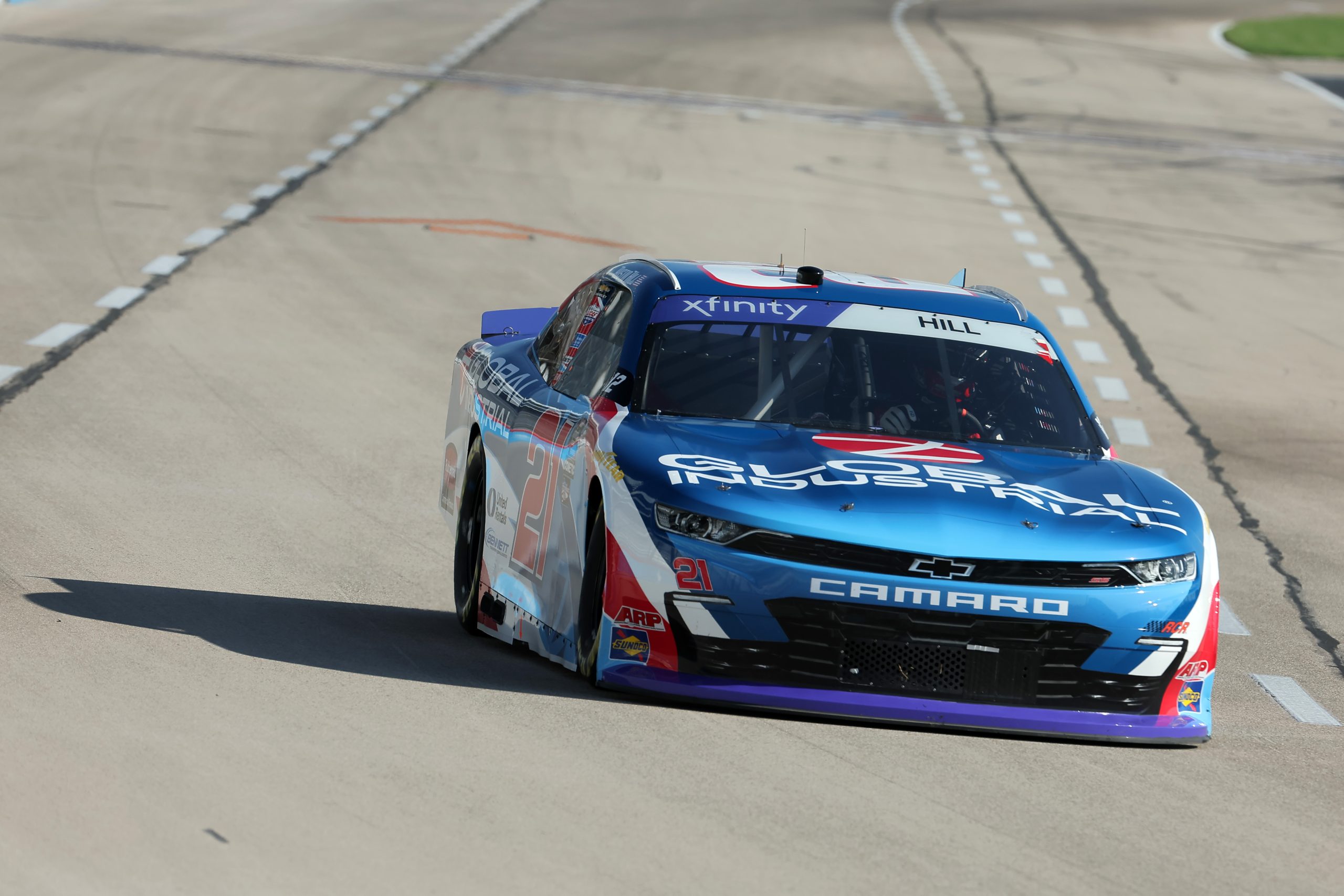 FORT WORTH, TEXAS - SEPTEMBER 23: Austin Hill, driver of the #21 Global Industrial Chevrolet, drives during practice for the NASCAR Xfinity Series Andy's Frozen Custard 300 - Practice at Texas Motor Speedway on September 23, 2023 in Fort Worth, Texas. (Photo by Jonathan Bachman/Getty Images) | Getty Images