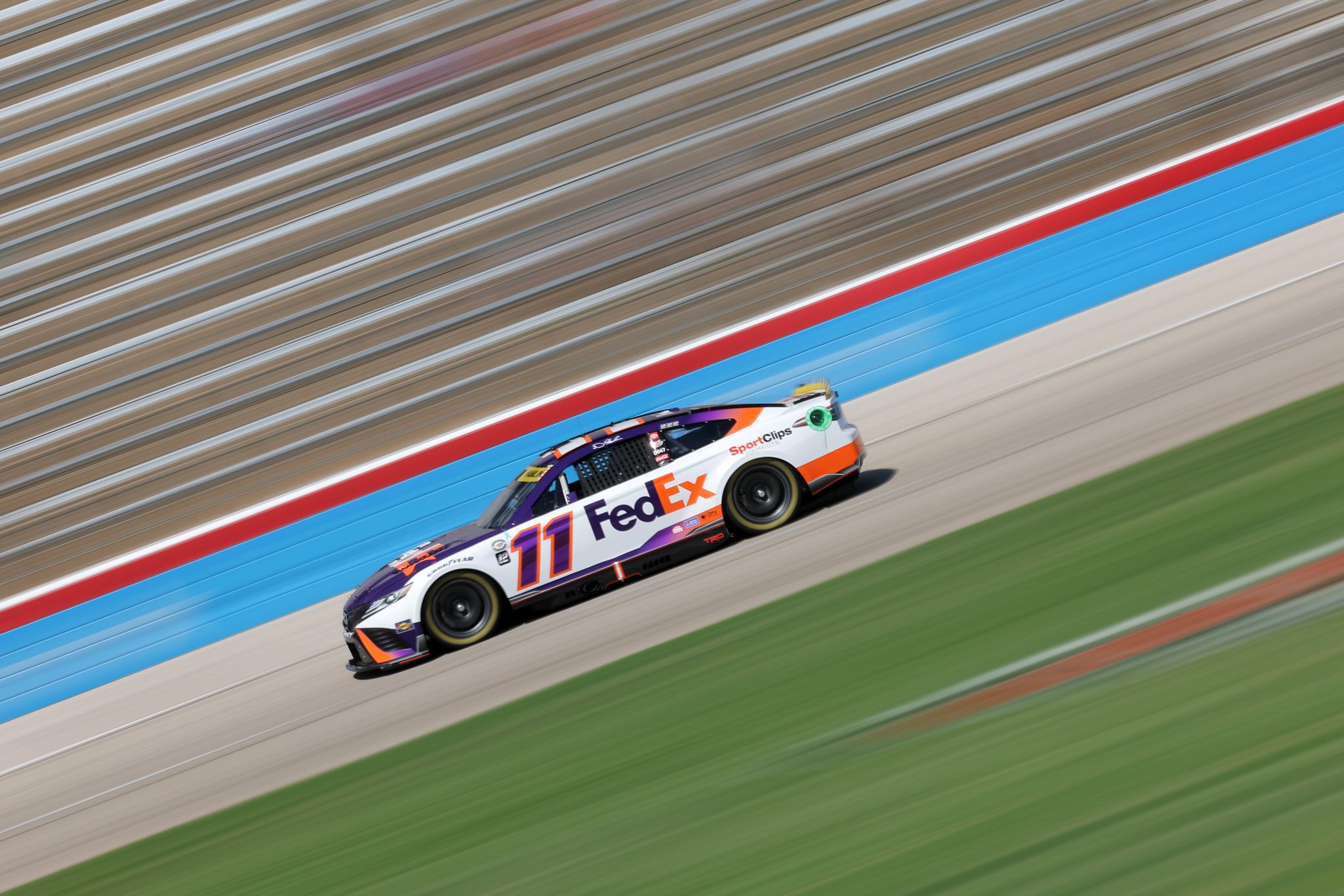 FORT WORTH, TEXAS - SEPTEMBER 22: Denny Hamlin, driver of the #11 FedEx Toyota, drives during practice for the NASCAR Cup Series Autotrader EchoPark Automotive 400 at Texas Motor Speedway on September 22, 2023 in Fort Worth, Texas. (Photo by Jonathan Bachman/Getty Images) | Getty Images