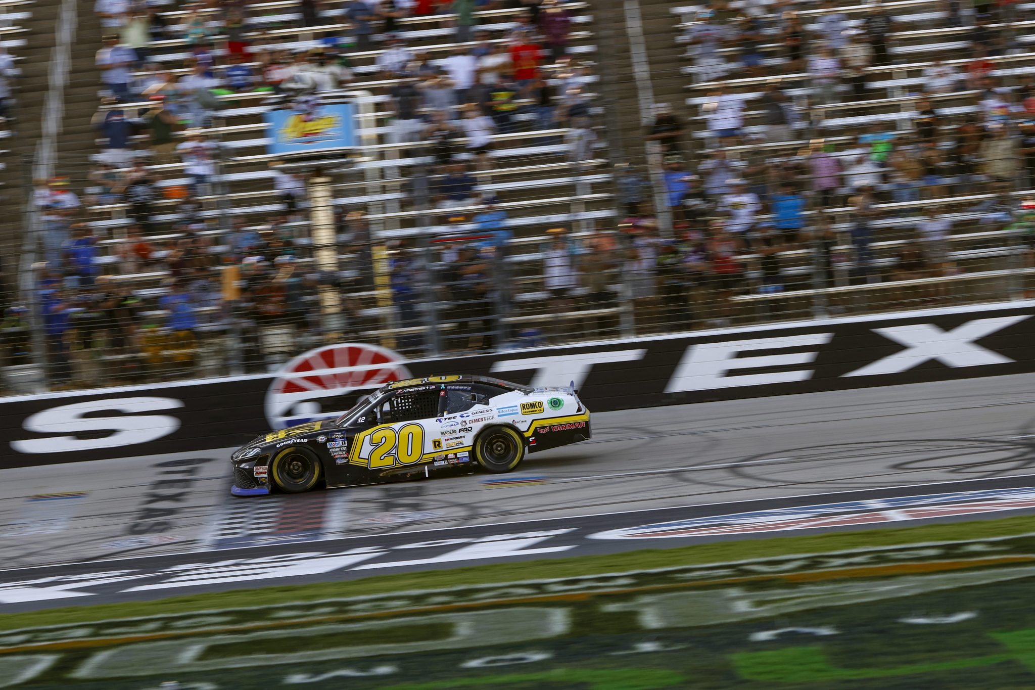 FORT WORTH, TEXAS - SEPTEMBER 23: John Hunter Nemechek, driver of the #20 Romco Equipment Toyota, crosses the finish line to win the NASCAR Xfinity Series Andy's Frozen Custard 300 at Texas Motor Speedway on September 23, 2023 in Fort Worth, Texas. (Photo by Chris Graythen/Getty Images) | Getty Images